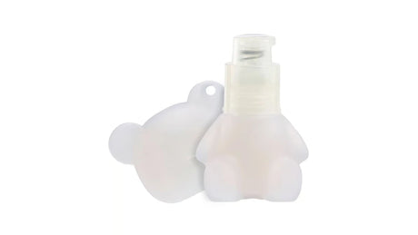 Mini Glam white bear shimmer lotion bottle with pump dispenser shown from the side 