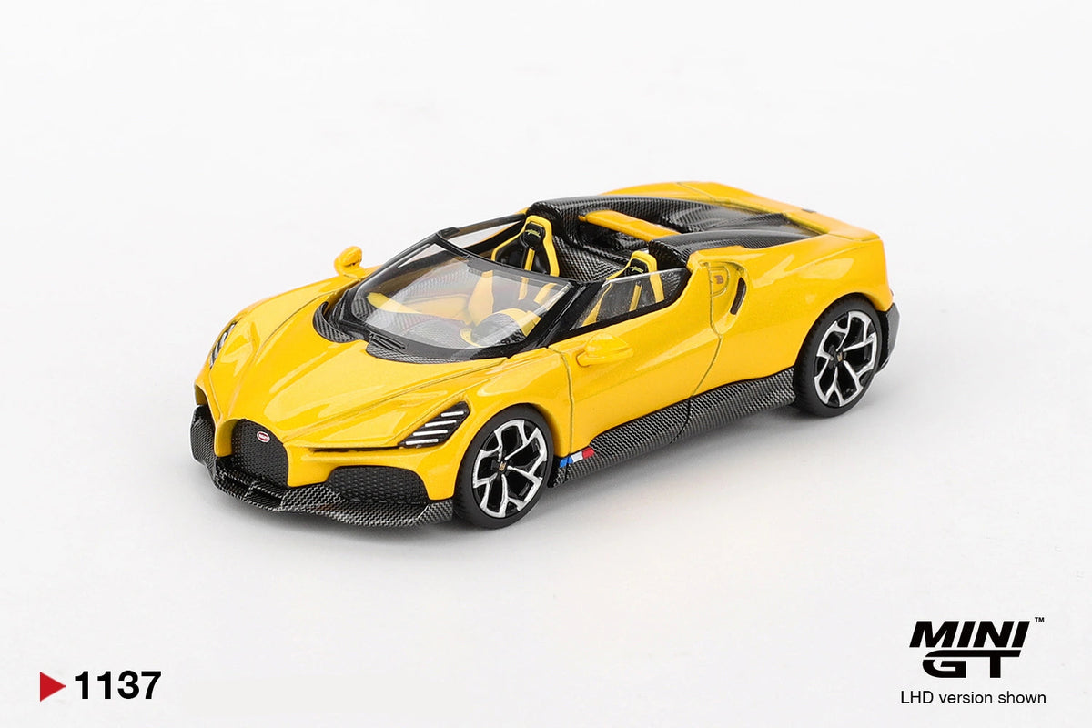 Mini GT Bugatti W16 Mistral Yellow LHD 1:64 diecast model viewed from the front, showing the Bugatti grille, black detailing, open cockpit and silver and black wheels