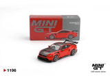 Mini GT Ford Mustang GTD Race Red LHD 1:64 diecast model displayed with its collector box, showing the red bodywork, black bonnet, silver wheels and rear racing wing.
