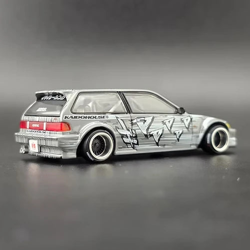 Mini GT Honda Civic EF Kaido Manga V1 rear three-quarter view showing rear lights, spoiler and manga graphics