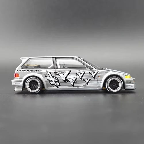 Mini GT Honda Civic EF Kaido Manga V1 side profile showing lowered stance, alloy wheels and manga graphics