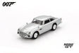 Mini GT James Bond Skyfall Aston Martin DB5 Battle Damaged RHD front three-quarter view showing damaged windows and bullet marks