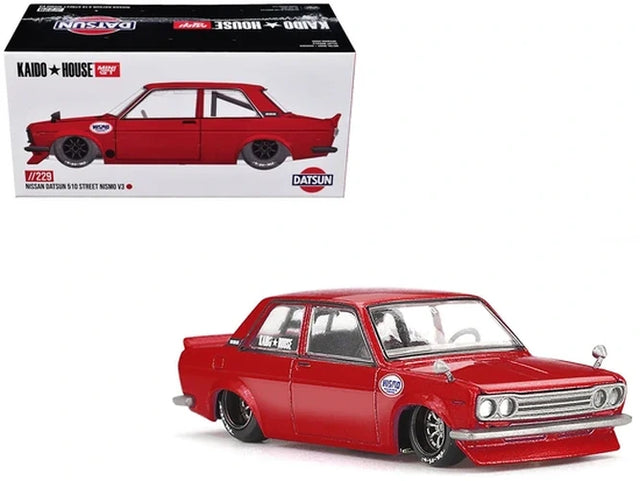 Mini GT x Kaido House Datsun 510 Street Nismo V3 with retail box and front three-quarter view of the red metallic model