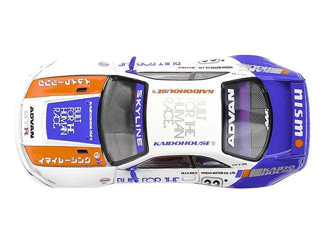 Mini GT x Kaido House Nissan Skyline GT-R R33 BFTHR V1 overhead view showing the white roof, orange bonnet graphics and blue rear section