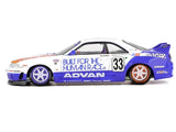 Mini GT x Kaido House Nissan Skyline GT-R R33 BFTHR V1 side profile showing number 33, Advan graphics and mismatched purple and bronze wheels