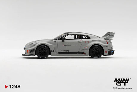 Side profile of Mini GT Nissan LB-Silhouette WORKS GT 35GT-RR Matt Grey RHD showing Liberty Walk graphics, race number 06, black multi-spoke wheels, widened wheel arches and large rear wing.
