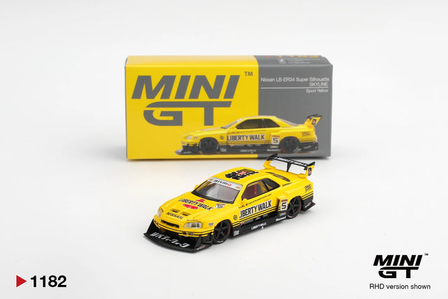 Mini GT Nissan LB-ER34 Super Silhouette Skyline Sport Yellow RHD 1:64 diecast model shown from the front with its collector box, Liberty Walk racing graphics, black wheels and large rear wing.