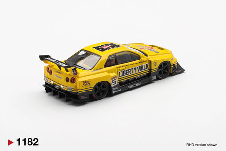 Rear three-quarter view of Mini GT Nissan LB-ER34 Super Silhouette Skyline Sport Yellow RHD showing four round taillights, black rear diffuser, Liberty Walk rear wing and yellow racing bodywork.