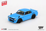 Front three quarter view of Mini GT Nissan LB Works Hakosuka Baby Blue showing the front grille, bumper guard, black wheels, widened arches and rear spoiler