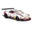 Mini GT Nissan Silvia S13-R Circuit Spec V1 front three-quarter view with white, red and black racing graphics and rear wing