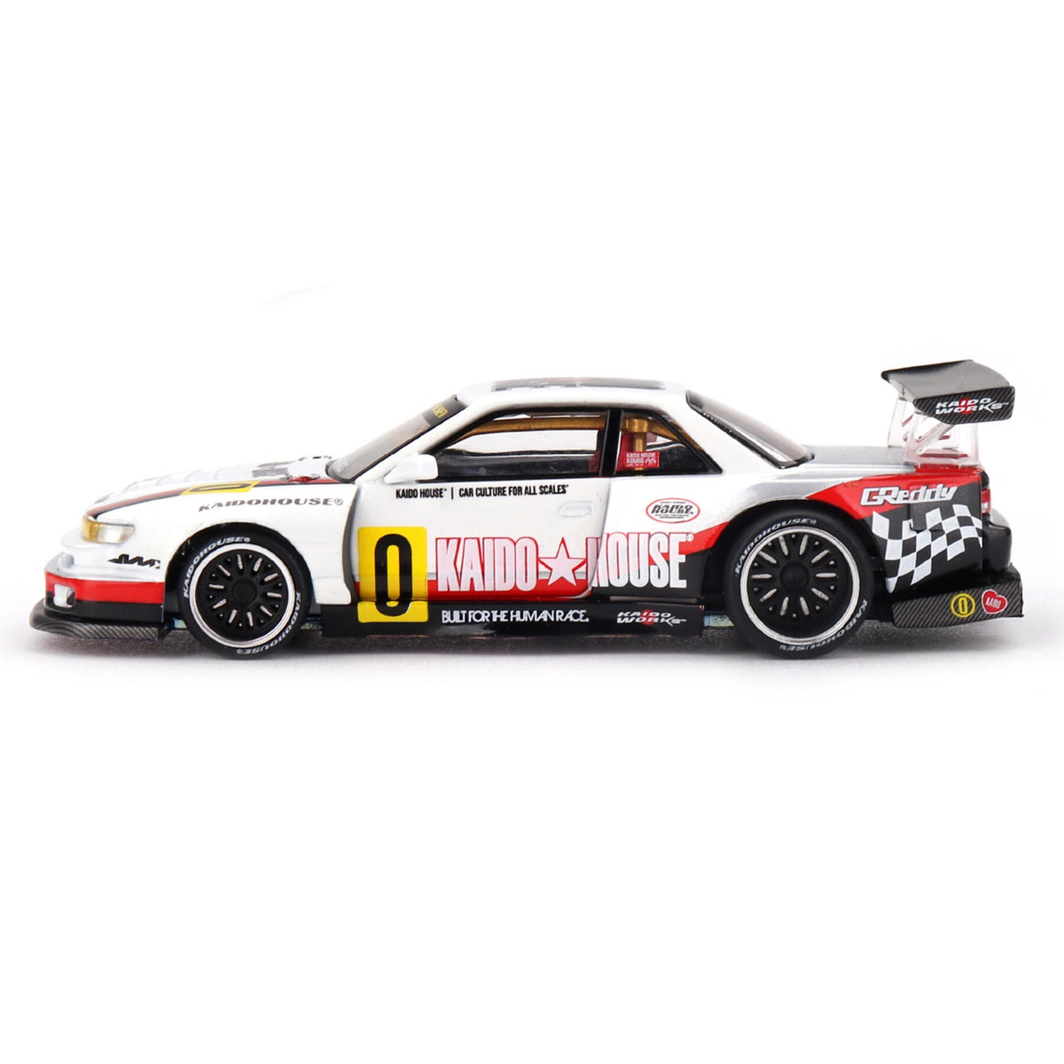 Mini GT Nissan Silvia S13-R Circuit Spec V1 side profile showing race number 0, Kaido House graphics and rear wing