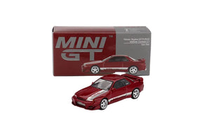Mini GT Nissan Skyline GT-R R32 VeilSide Combat C-I Gem Red RHD displayed with its Mini GT box
