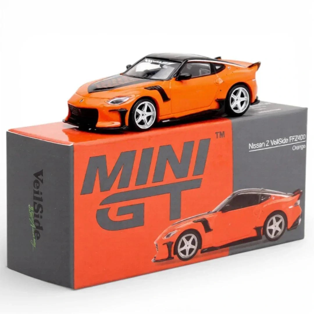 Mini GT Nissan Z VeilSide FFZ400 Orange RHD displayed on its Mini GT VeilSide presentation box