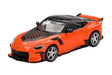 Mini GT Nissan Z VeilSide FFZ400 Orange RHD front angled view showing the VeilSide front bumper, black roof and rear wing