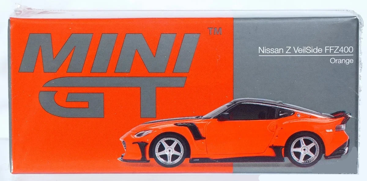 Mini GT Nissan Z VeilSide FFZ400 Orange RHD retail box with side profile artwork of the orange model