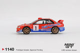 Side profile of Mini GT Subaru Impreza WRC97 No.1 1999 DRM Champion LHD showing Norisbank graphics, race number 1, gold wheels and rear wing