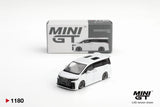 Mini GT Toyota Vellfire 40 KUHL White 1:64 diecast model shown from the front with its collector box, black grille and custom wheels. Promotional image labelled LHD version shown.