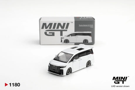 Mini GT Toyota Vellfire 40 KUHL White 1:64 diecast model shown from the front with its collector box, black grille and custom wheels. Promotional image labelled LHD version shown.
