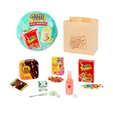 MGA's Miniverse Real Brands Series 2 turquoise mystery capsule beside a miniature shopping bag and branded mini foods including Fruity Pebbles, Magnum ice cream, Meow Mix kitten food, Boursin cheese and IZZE drink.