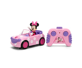Minnie RC Roadster 1:32 showing Minnie Mouse waving from a pink car with white polka dots, purple trim and a matching pink and purple two button remote controller.