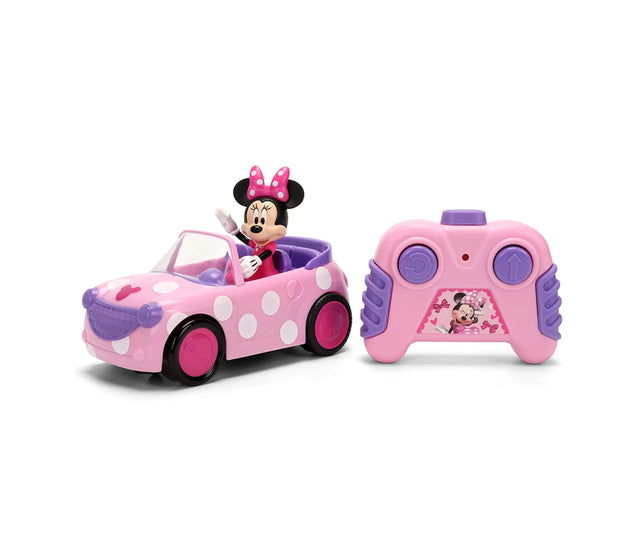 Minnie RC Roadster 1:32 showing Minnie Mouse waving from a pink car with white polka dots, purple trim and a matching pink and purple two button remote controller.