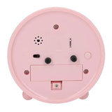 Back view of Miss Melody alarm clock with battery compartment and control buttons