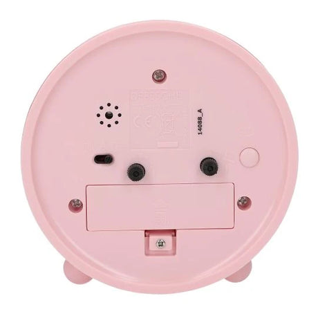 Back view of Miss Melody alarm clock with battery compartment and control buttons