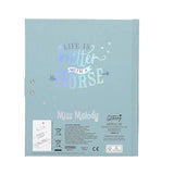 Pale blue back cover of the Miss Melody diary with decorative lettering and product information.