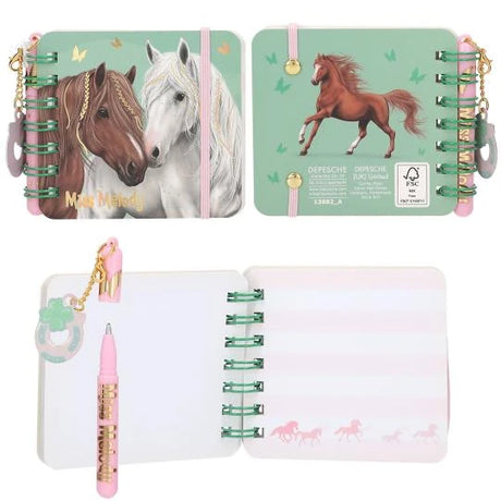 Miss Melody mini notebook with brown and white horses on the cover, a horse illustration on the back, open lined pages and a pink pen.