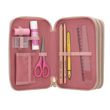 Open Miss Melody triple pencil case with glue stick, scissors, pencils, ruler, eraser and sharpener