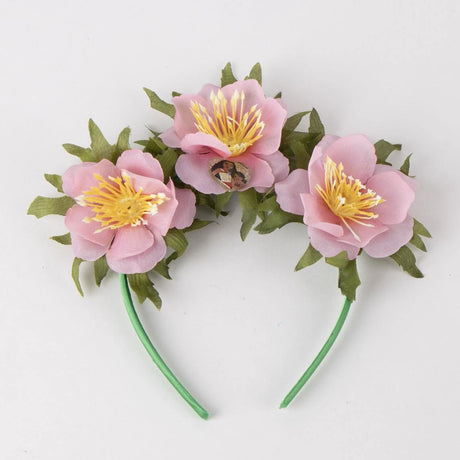 Moana floral headband with pink flowers, green leaves and Moana character detail
