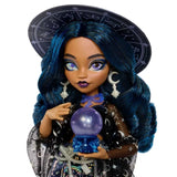 Monster High Moonspell Magic Claire de Luna holding a purple crystal ball