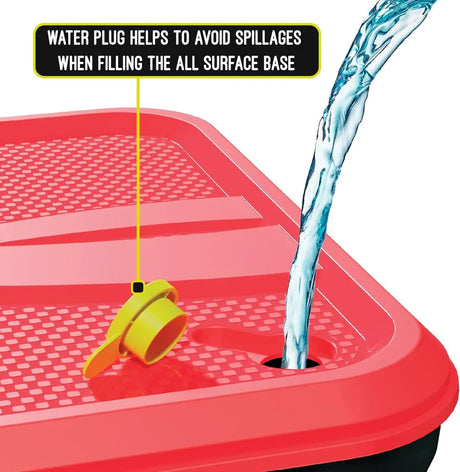 Mookie Classic All Surface Swingball red base with yellow water plug and water pouring in