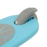 The rear section of a blue three wheel scooter showing a grey footbrake and back wheel