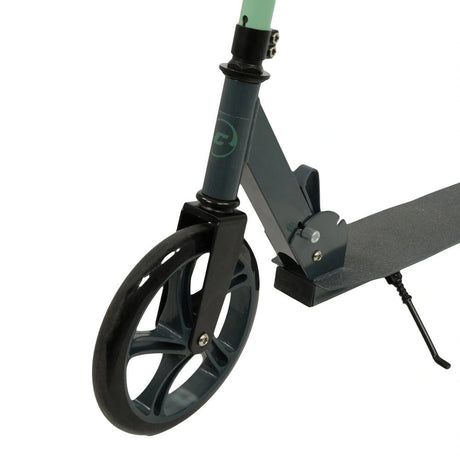 MoVe Urban Commuter Scooter close view showing the front wheel and folding joint