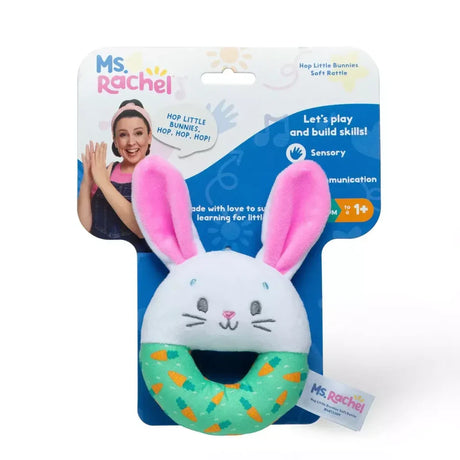 Ms. Rachel Hop Little Bunnies soft rattle shown on branded packaging