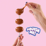 Brown Mushmeez Sweet Friends stacked Taba squishy being stretched by hand