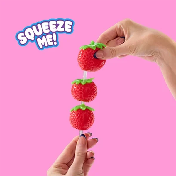 Strawberry Mushmeez Sweet Friends stacked Taba squishy being squeezed between two hands