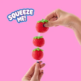 Strawberry Mushmeez Sweet Friends stacked Taba squishy being squeezed between two hands