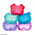 Five assorted MushyKinz Jelleez animal squishies stacked together in purple, pink, blue, green and red