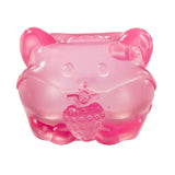 Pink MushyKinz Jelleez hamster squishy holding a strawberry