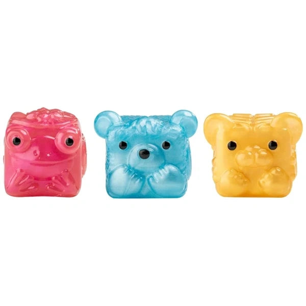 MushyKinz Shimmer Gemz pink, blue and yellow mini Taba squishies on a white background