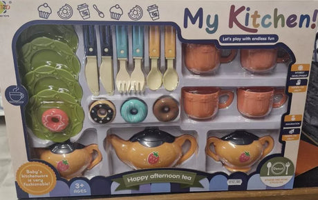 My Kitchen Happy Afternoon Tea Set box showing teapots, cups, plates, cutlery, toy doughnuts and 3+ age mark