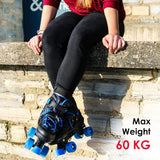 Lifestyle image showing MY Quad X Skate blue and black quad skates worn outdoors with bright blue wheels