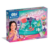 Clementoni Nail Lab box showing the turquoise workstation, nail polish bottles, mixing tools and decorated nails.