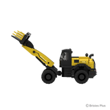 Side profile of the BRIXIES Plus New Holland W170D+ facing left with the loader arm raised, enclosed cab and four black tyres visible