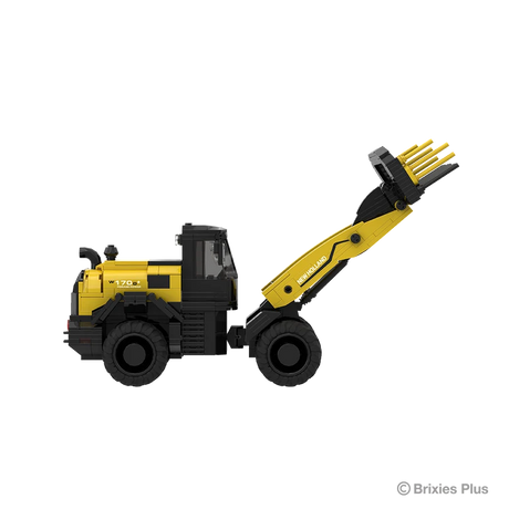 Side profile of the New Holland W170D+ BRIXIES model facing right with New Holland branding on the loader arm and the raised front attachment visible
