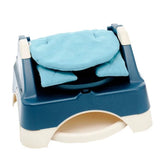 Oketi Poketi Wooded booster seat folded with turquoise padded cover and white base