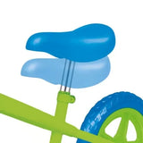 Close up of the Ozbozz My First Balance Bike blue saddle, green frame and rear wheel