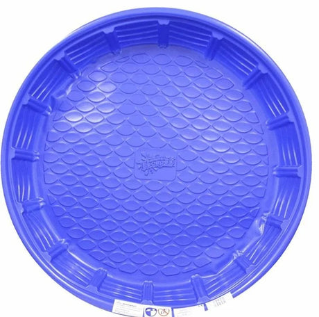 Blue round rigid plastic paddling pool and sand pit viewed from above showing textured scale pattern base on white background